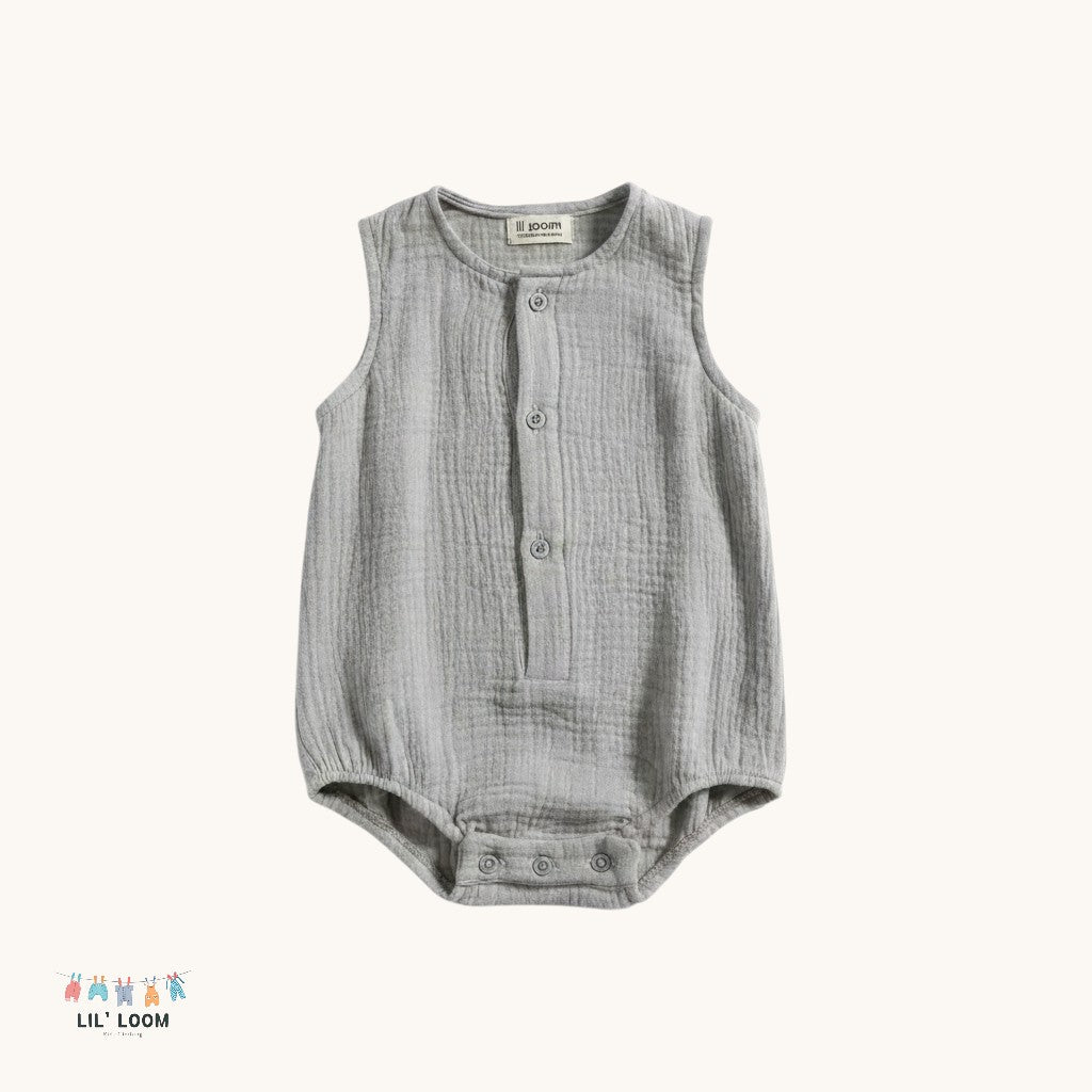 stone Gray baby muslin cotton romper with buttons on a white background, featuring the brand 'Lil' Loom'.