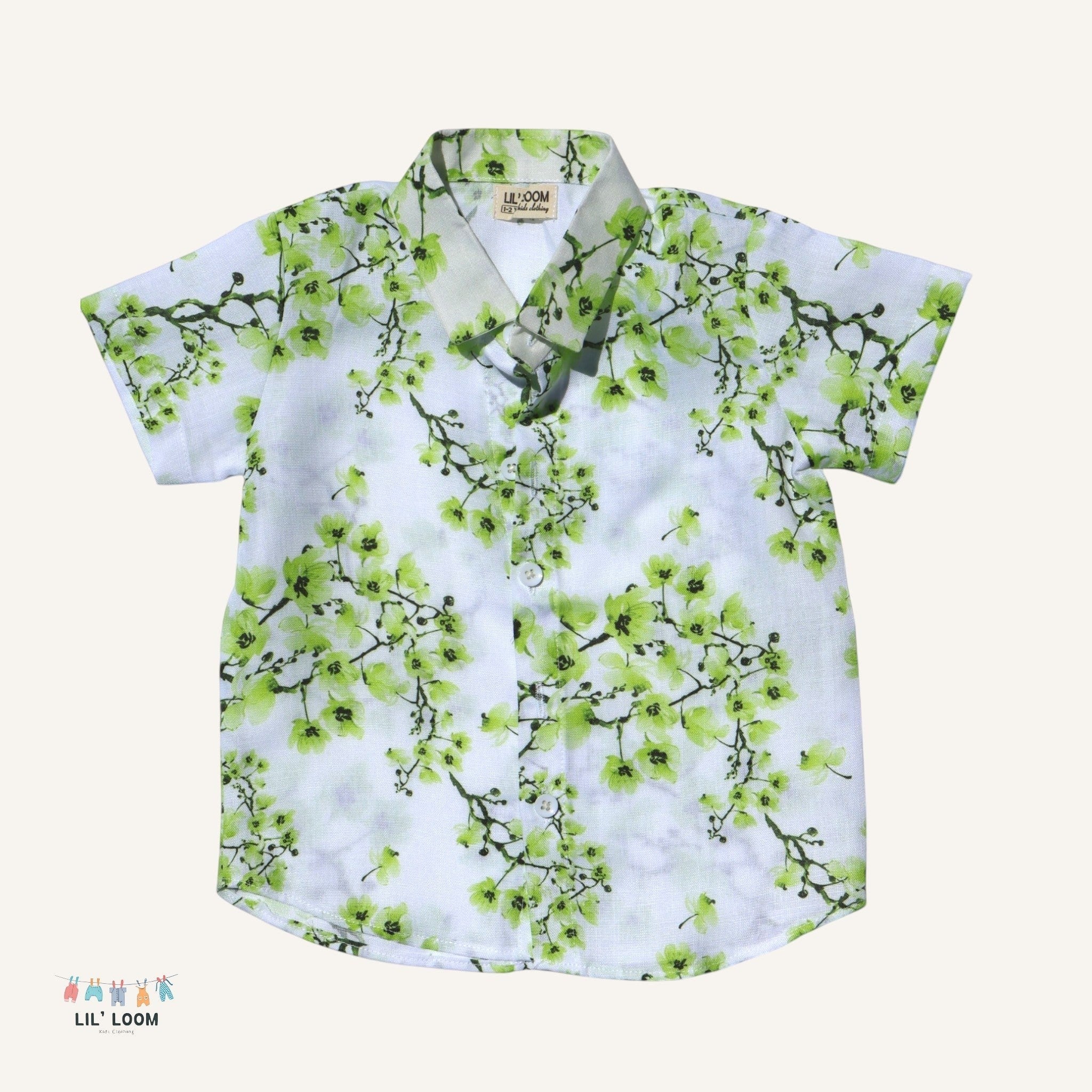 lilloom boys' white short-sleeve collared shirt with green floral print, made of cotton.