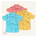 lilloom Summer Skies Boys Linen Shirts in coral, aqua, and yellow. Pure linen, short-sleeve button-up shirts for boys.