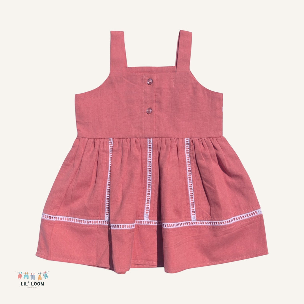 LIL' LOOM coral pink cotton candy strap dress with white trim detail and button closure. Perfect for summer.