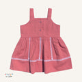 LIL' LOOM coral pink cotton candy strap dress with white trim detail and button closure. Perfect for summer.