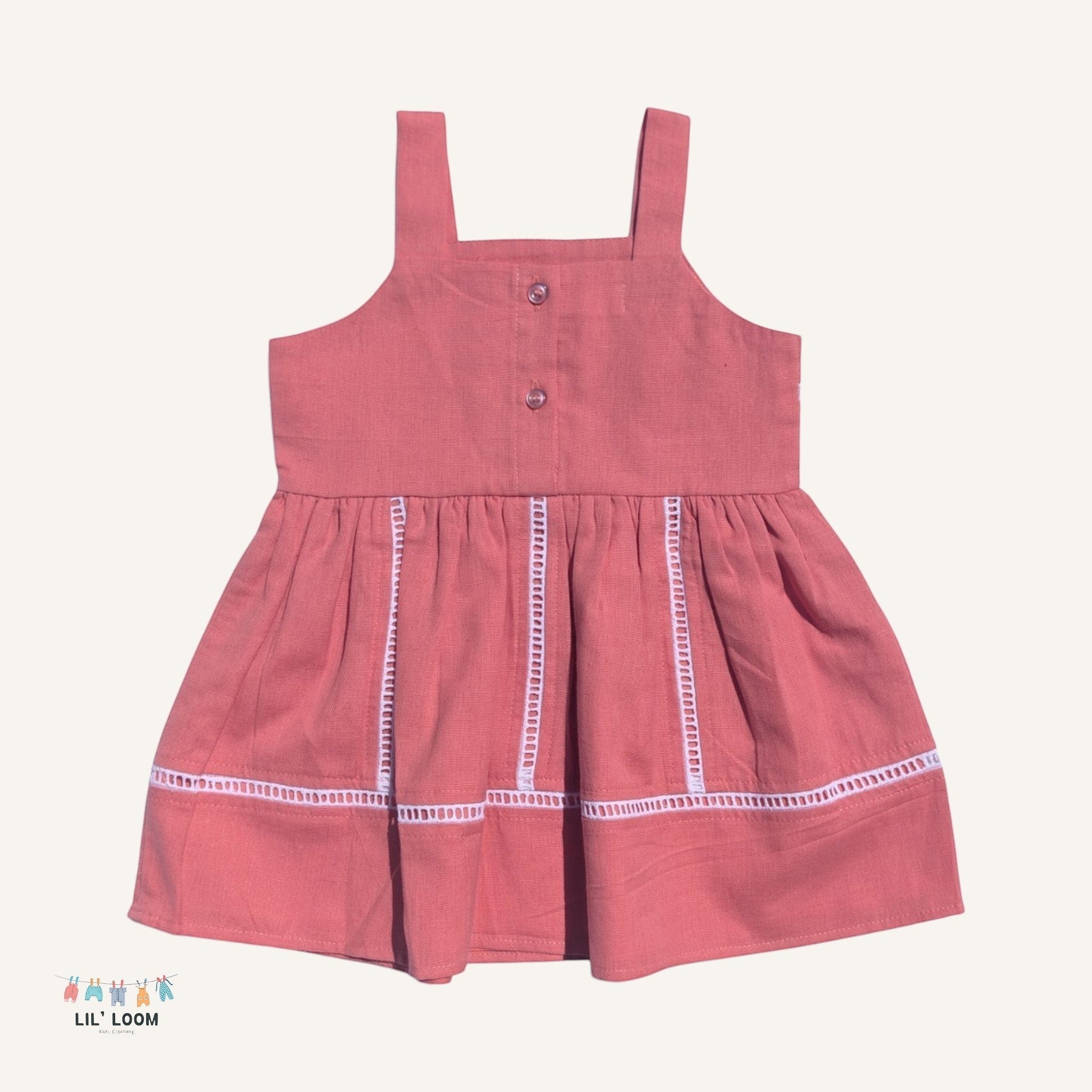 LIL' LOOM coral pink cotton candy strap dress with white trim detail and button closure. Perfect for summer.