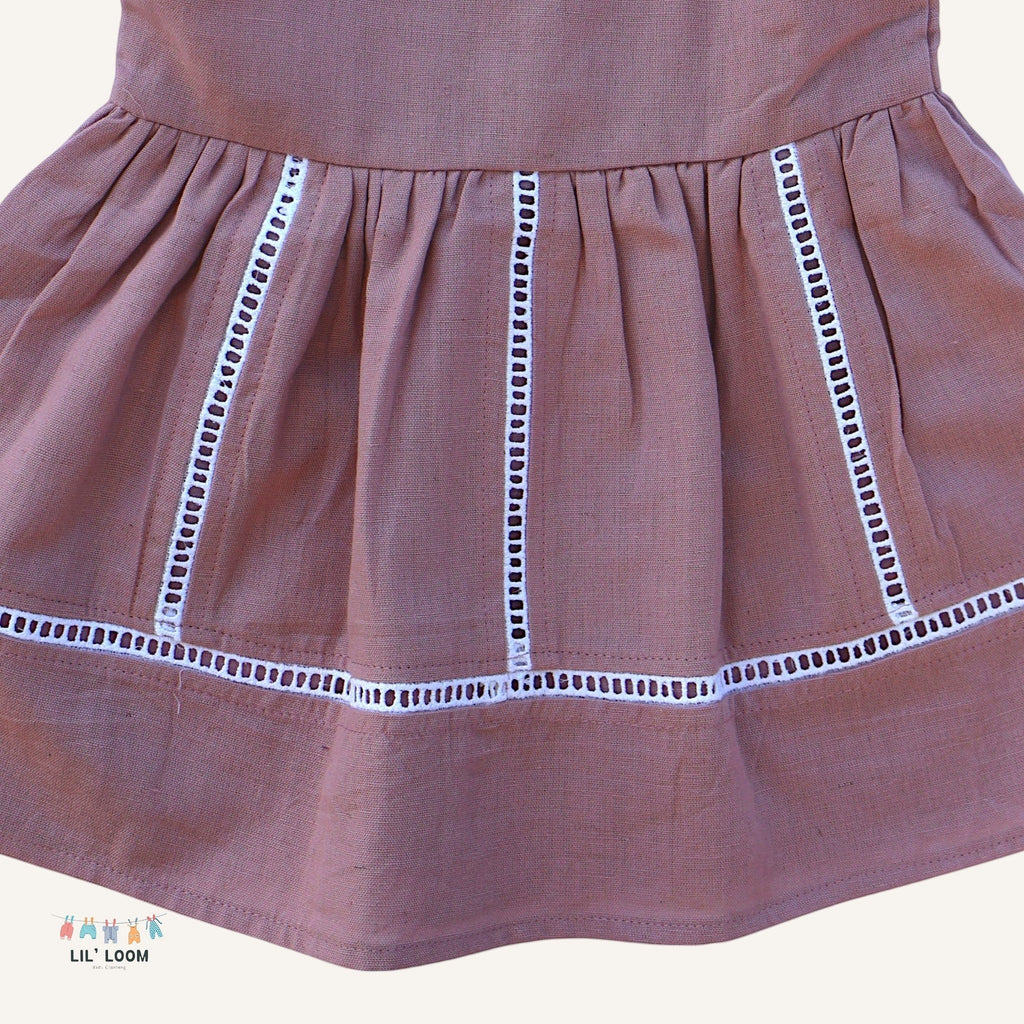 LIL' LOOM Cotton Candy Strap Dress in mauve, 100% cotton with white eyelet trim and gathered skirt.