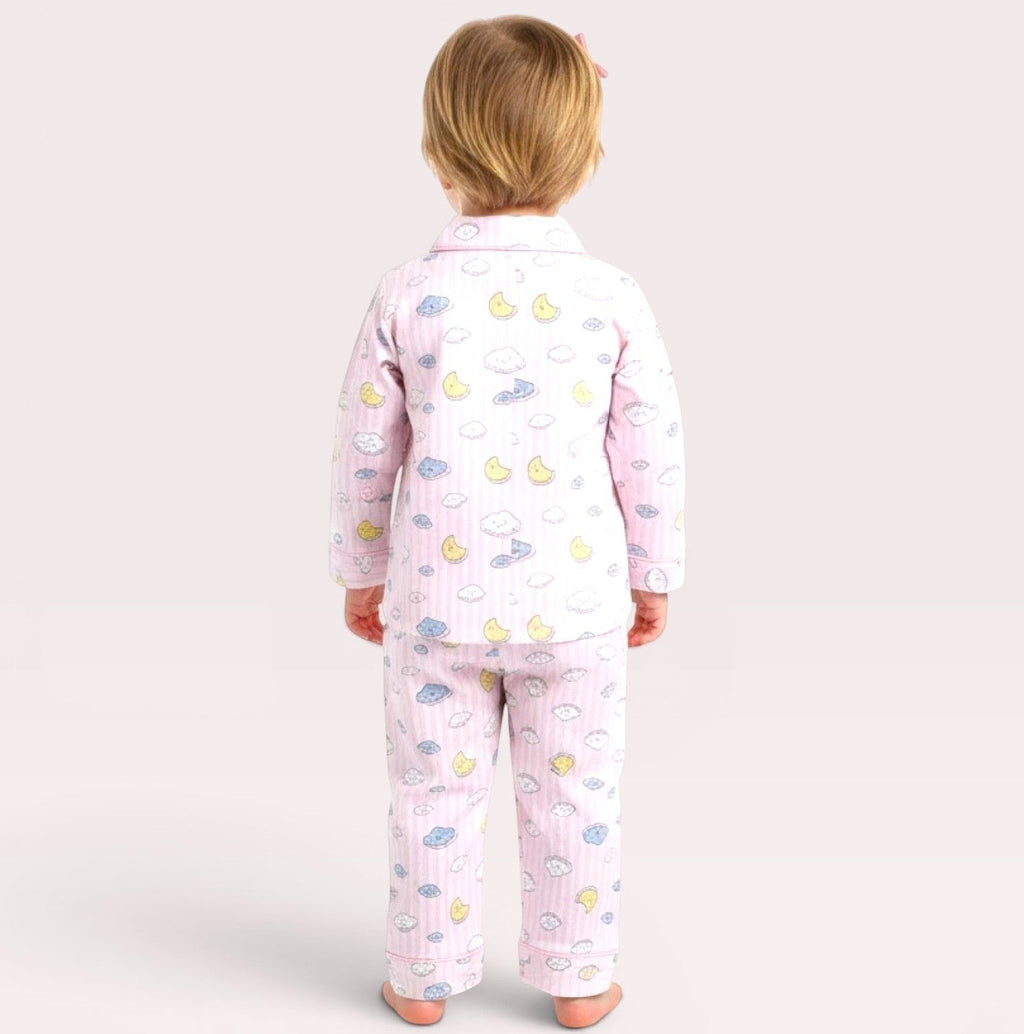 lilloom pink cotton pajama set with clouds, moons, and stars print for girls. Button-front top and elastic waistband pants.